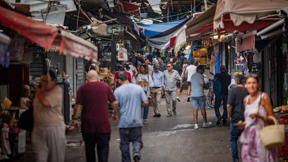 שוק הכרמל בתל אביב בזמן המלחמה עם איראן, יוני 2025