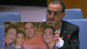 אלי שרעבי ותמונת משפחתו