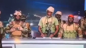 פסקל טיגרי וכוחותיו במטה הטלוויזיה הממלכתית בבנין