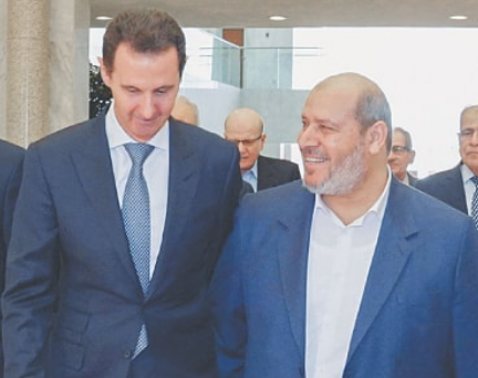 בשאר אסד עם חליל אל-חייה